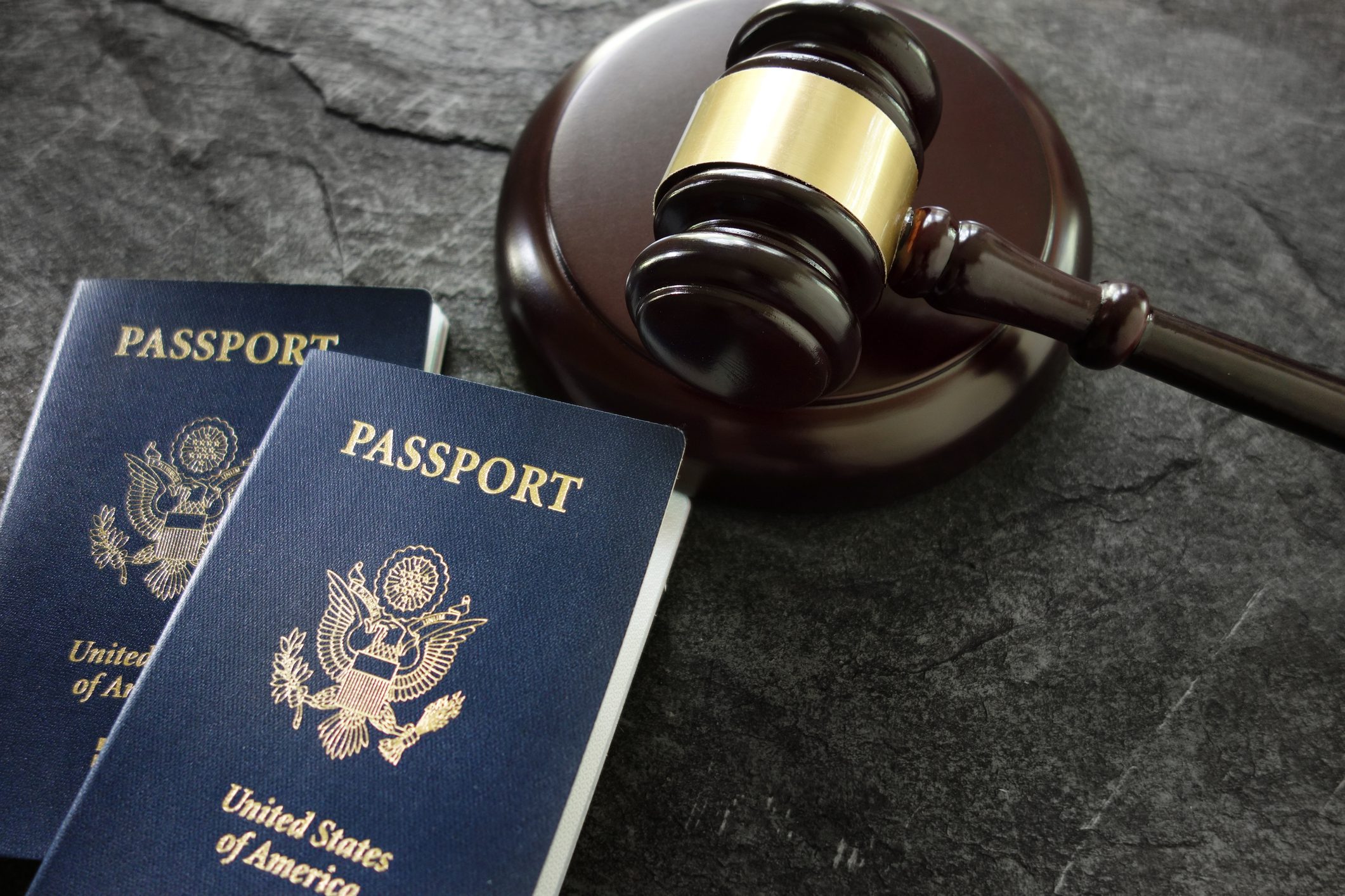 Gavel and passports US passports and judges legal gavel